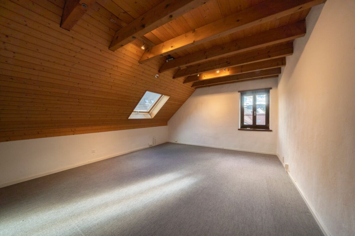 Ausgebauter Dachraum mit Holzbalkendecke
