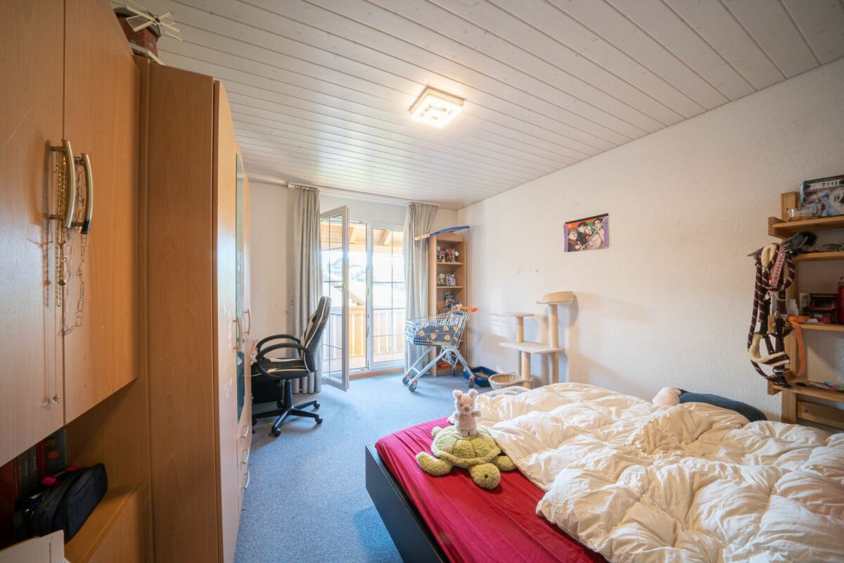 Schlafzimmer mit Balkonzugang