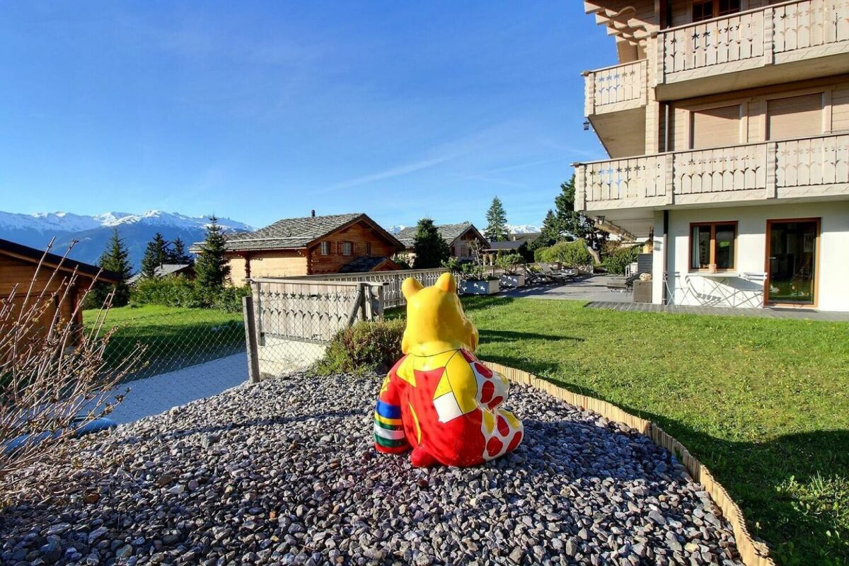 Alpenwohnung mit Garten und Bergblick
