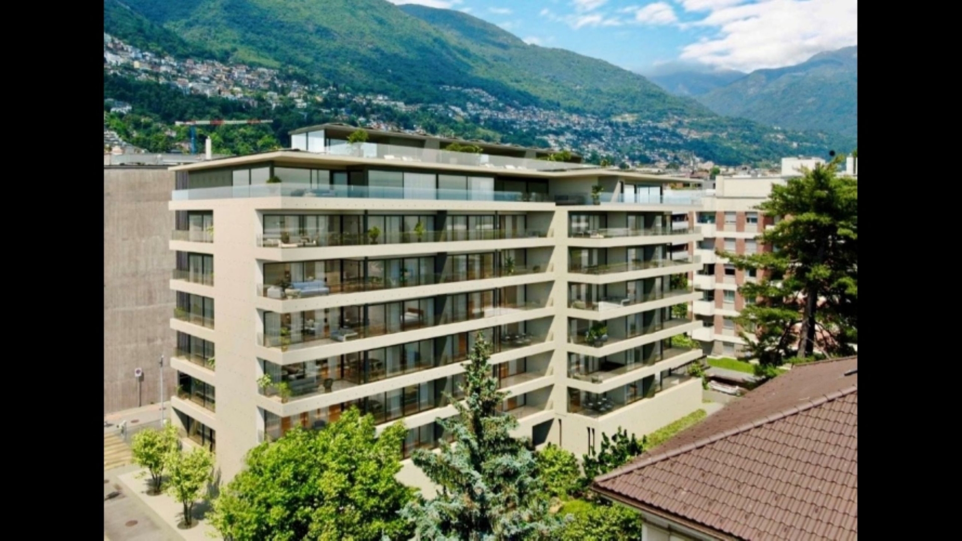 Modernes Mehrfamilienhaus mit Bergblick