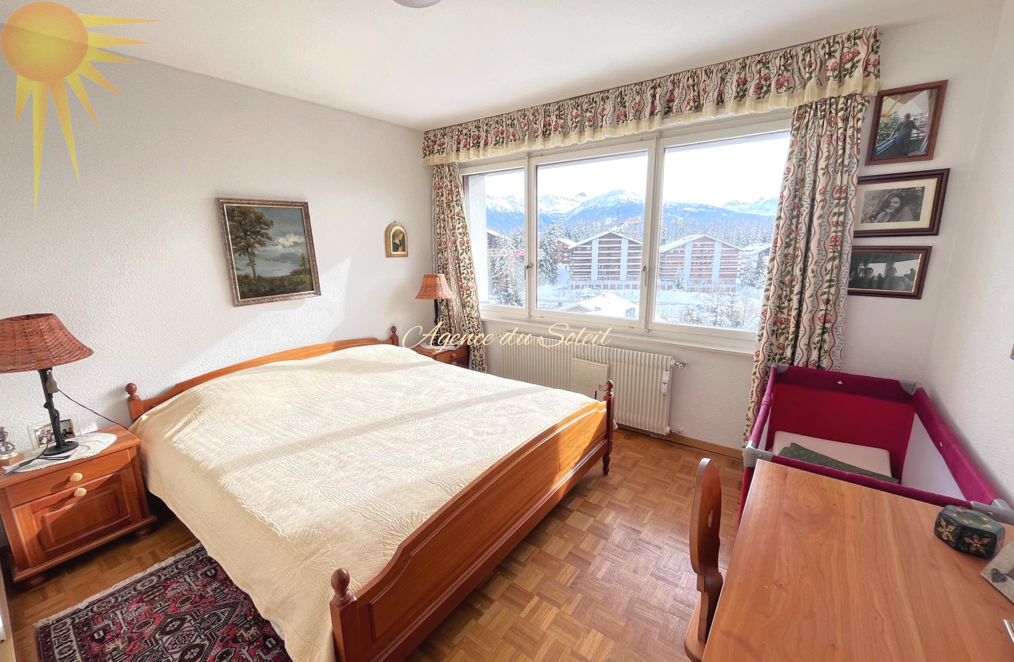 Schlafzimmer mit Bergblick