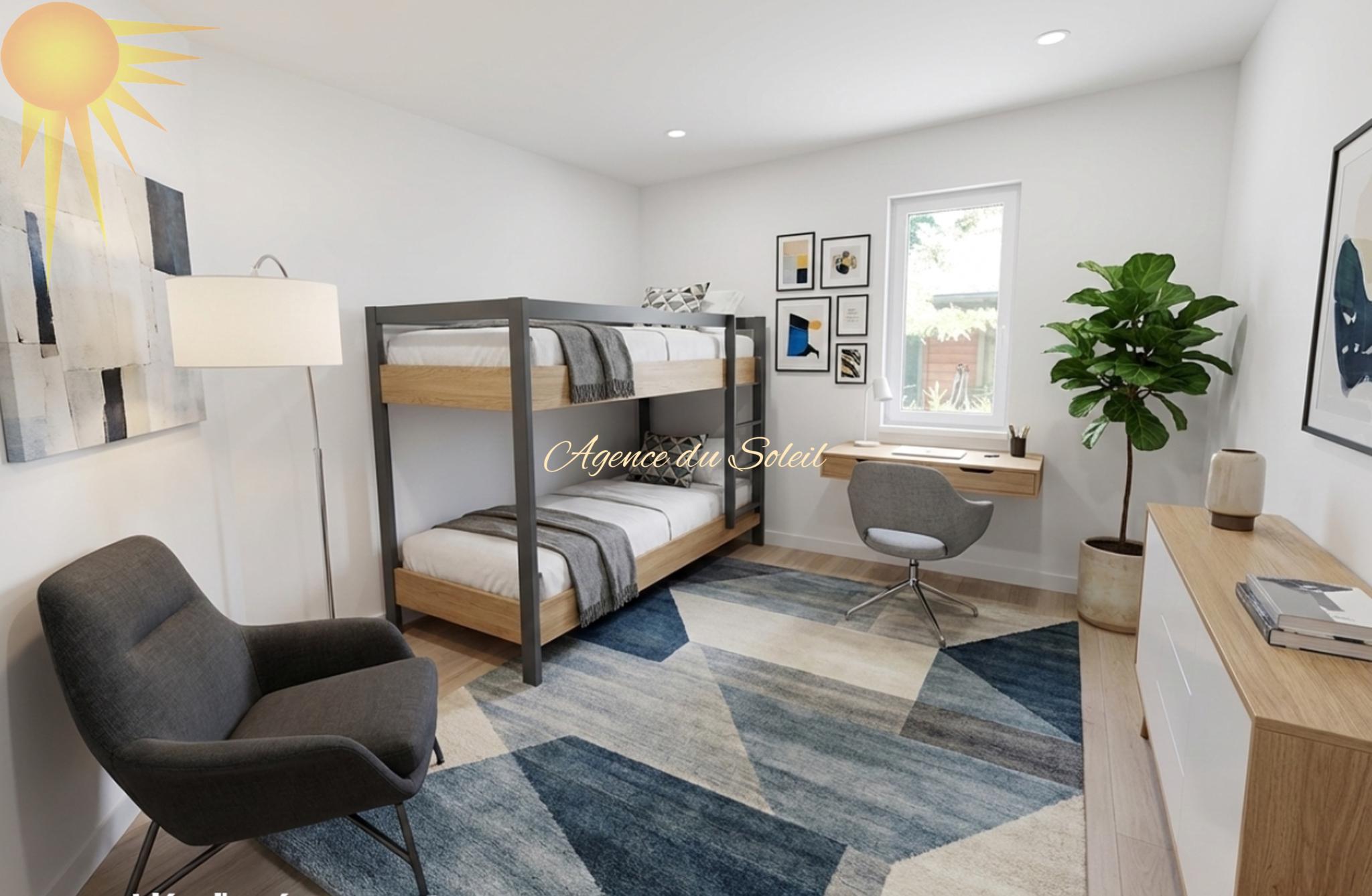 Kinderzimmer mit Etagenbett und Arbeitsplatz