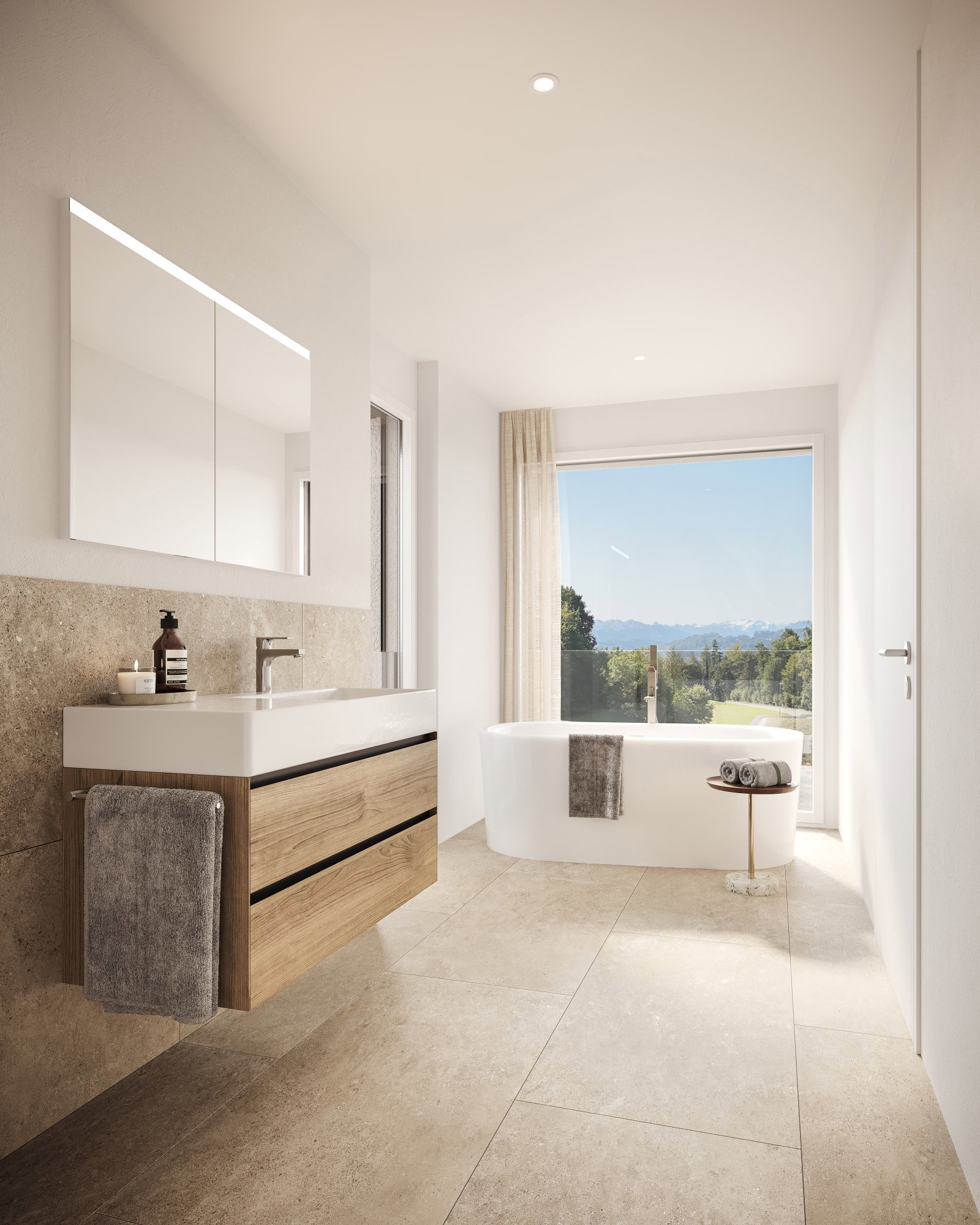 Helles modernes Badezimmer mit Badewanne und Bergblick