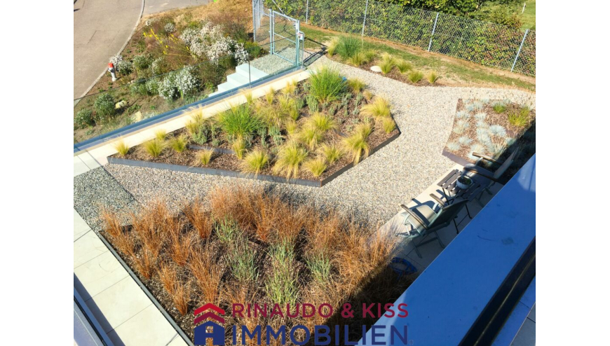 Dachterrasse mit Kiesgarten und Sitzbereich