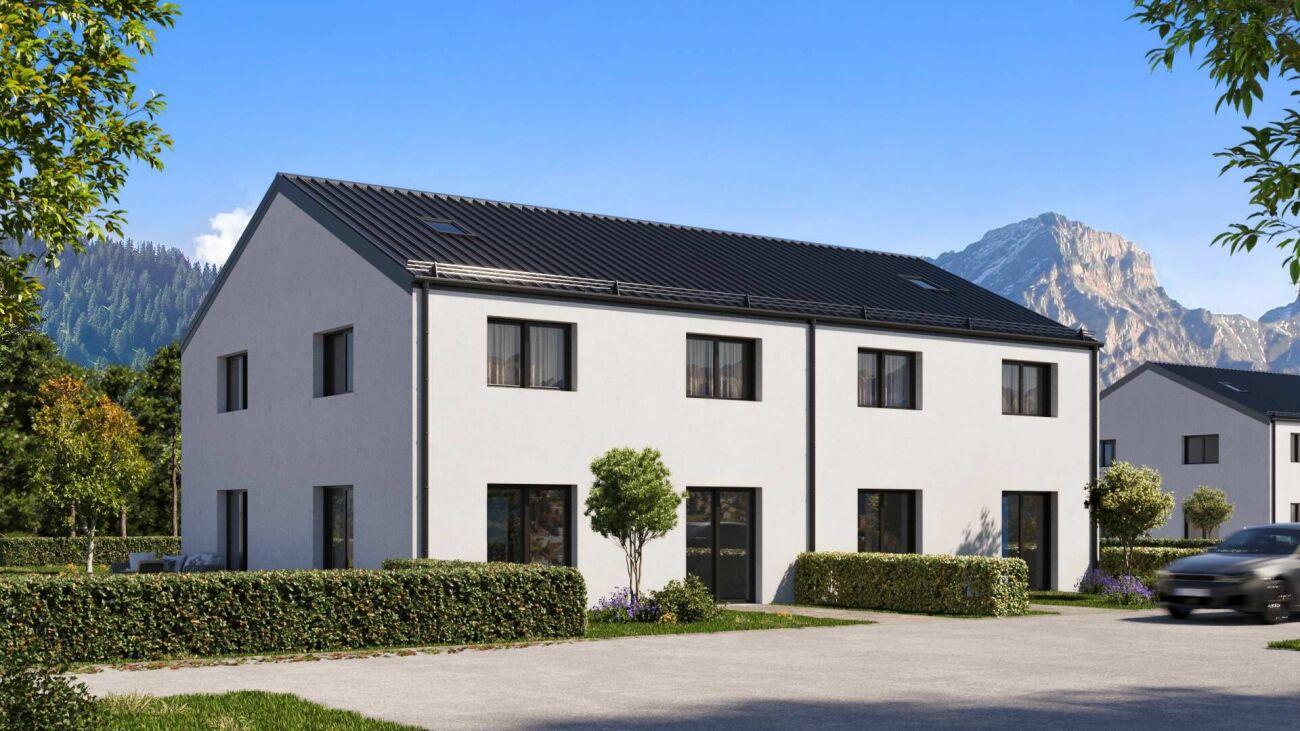 Moderne Wohnanlage mit Bergkulisse
