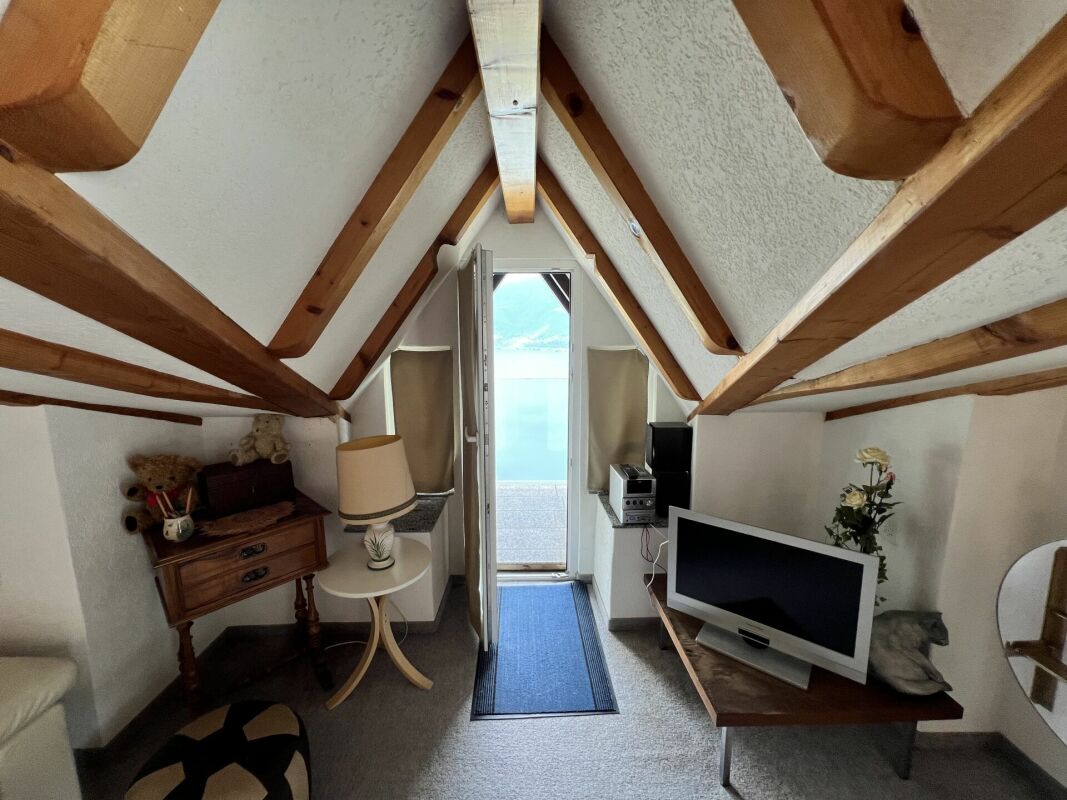 Mansardenzimmer mit Meerblick