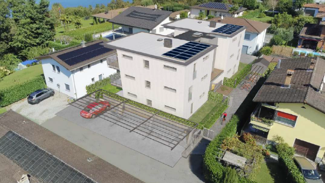 Luftaufnahme einer Wohnsiedlung mit Solardächern