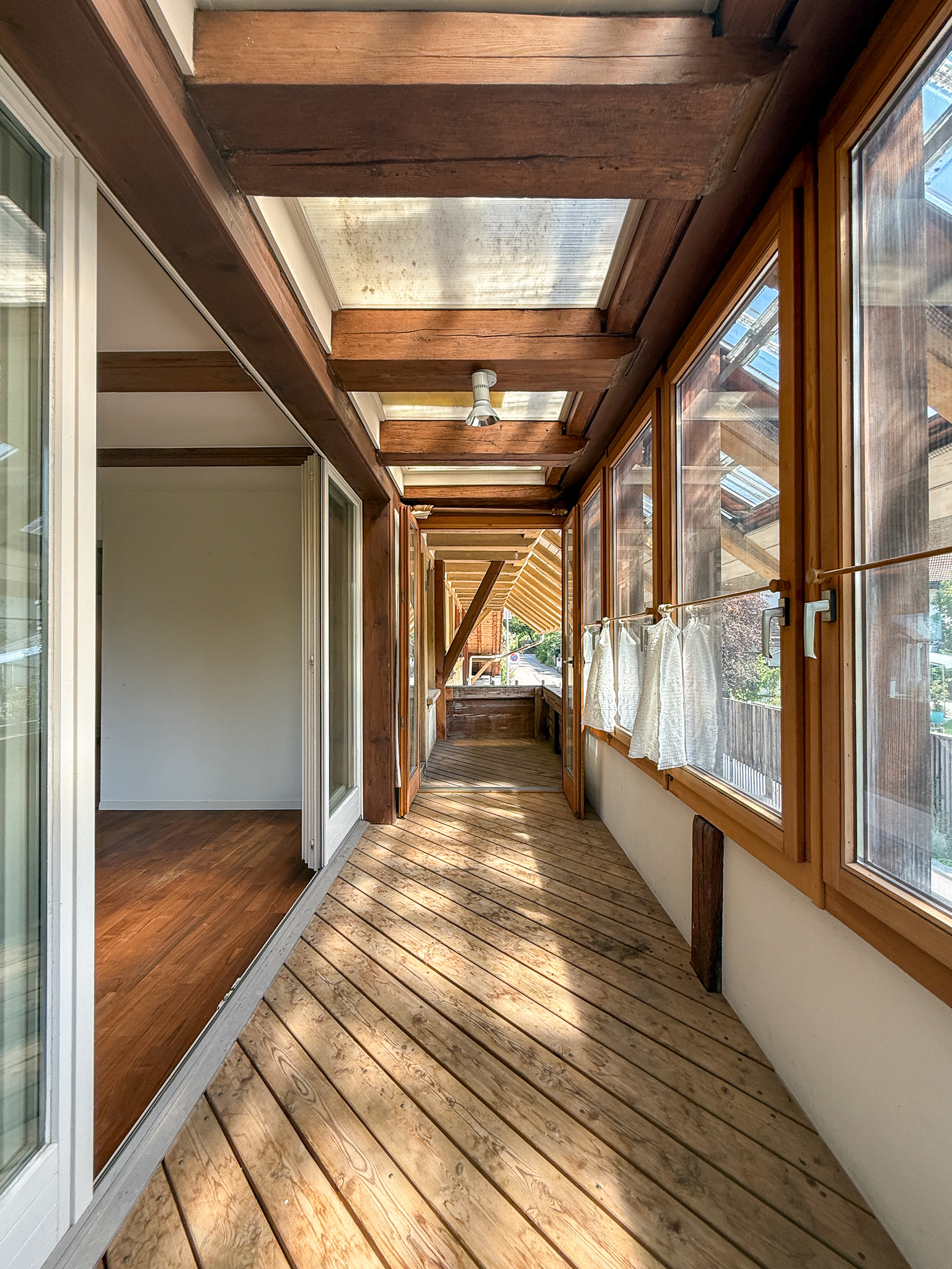 Verglaste Holzveranda