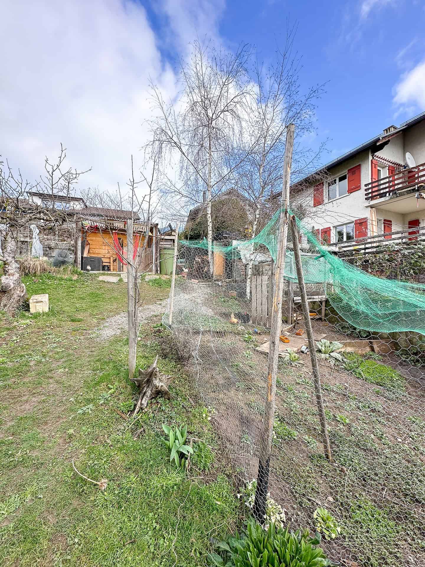 Garten mit Einfamilienhaus