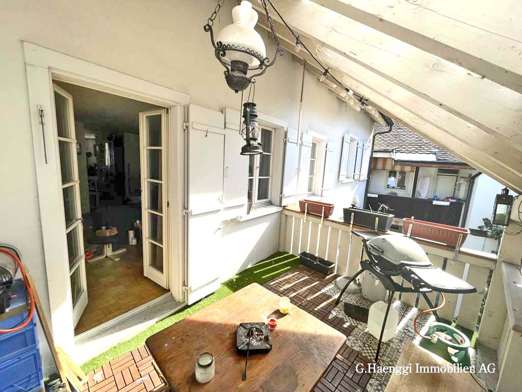 Dachterrasse mit Grill und französischen Türen