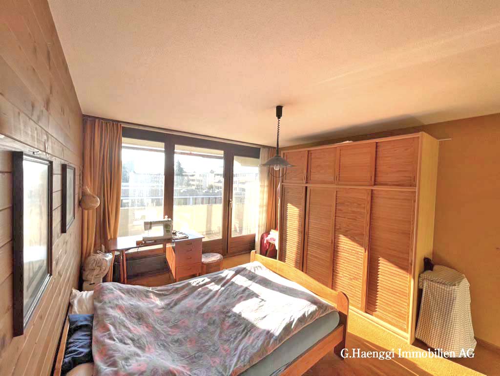 Schlafzimmer mit Balkonzugang