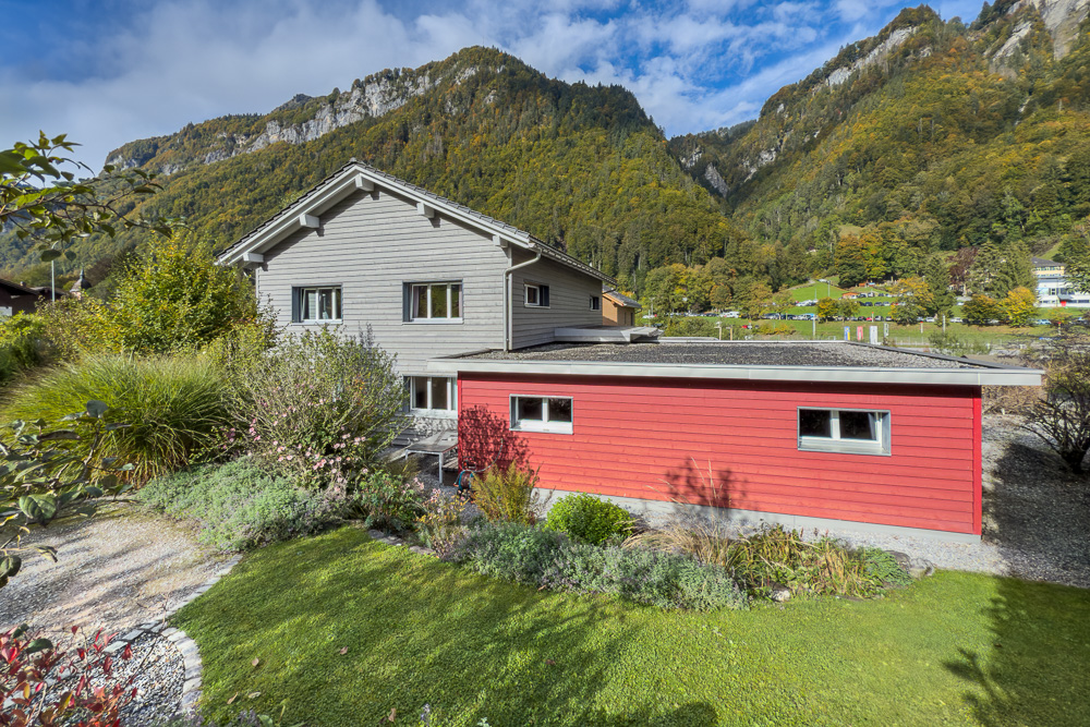 Haus in alpiner Landschaft