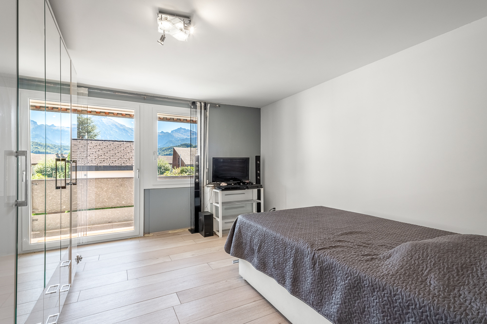 Schlafzimmer mit Balkonzugang