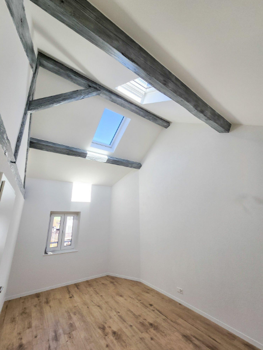 Ausgebauter Dachraum mit Sichtbalken