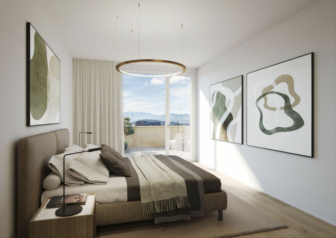 Helles Schlafzimmer mit moderner Einrichtung und Balkonzugang