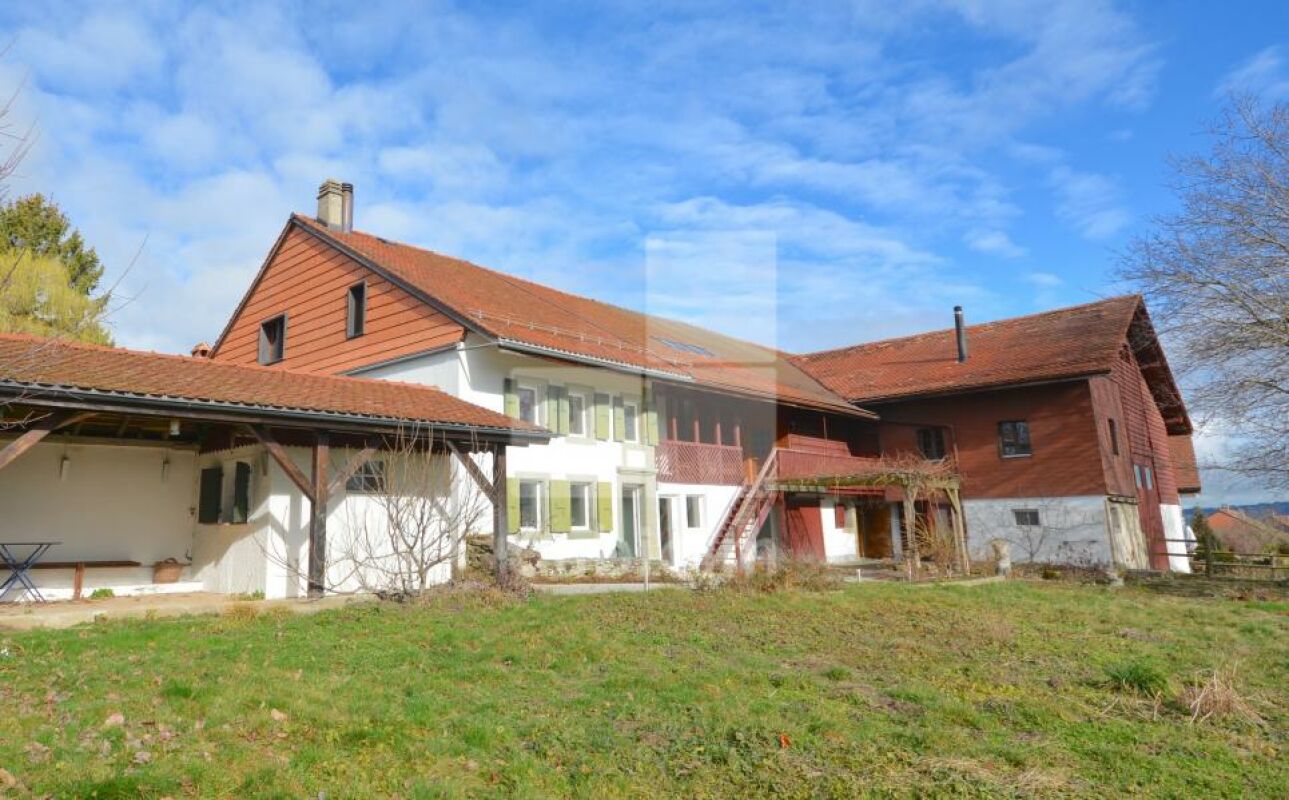 Ländliches Wohnhaus mit Nebengebäuden