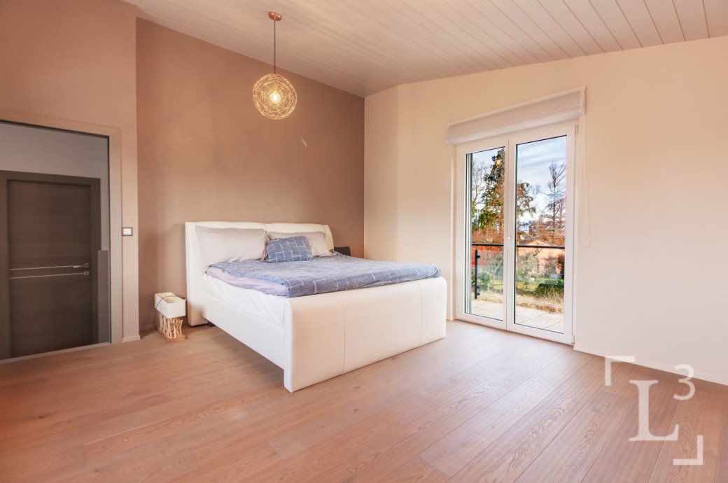 Schlafzimmer mit Balkonzugang