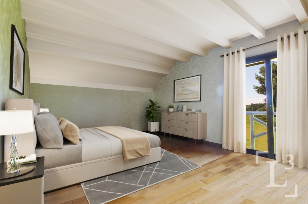 Helles Schlafzimmer mit Blick ins Grüne