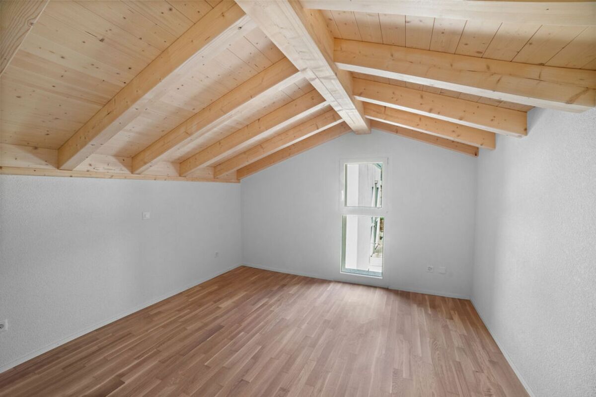 Ausgebauter Dachraum mit Holzbalkendecke