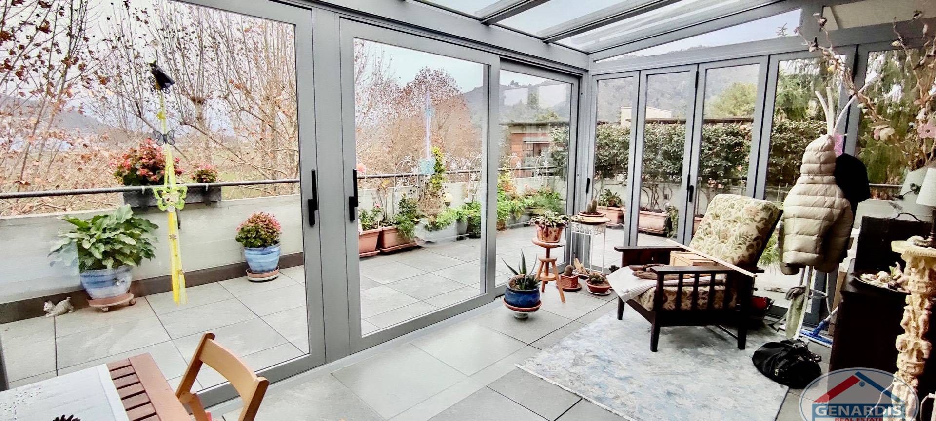 Veranda mit verglastem Wintergarten