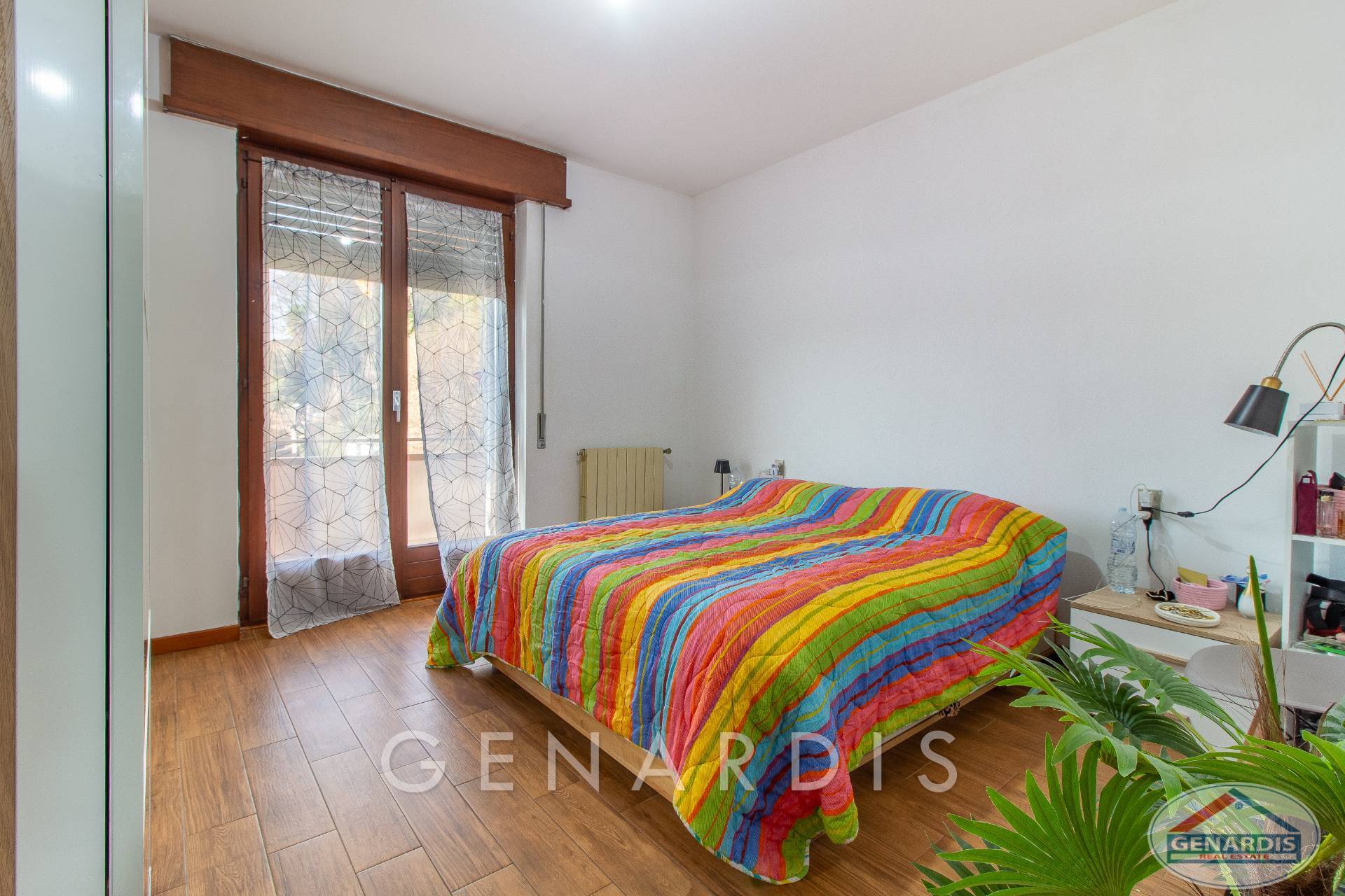 Schlafzimmer mit Balkonzugang