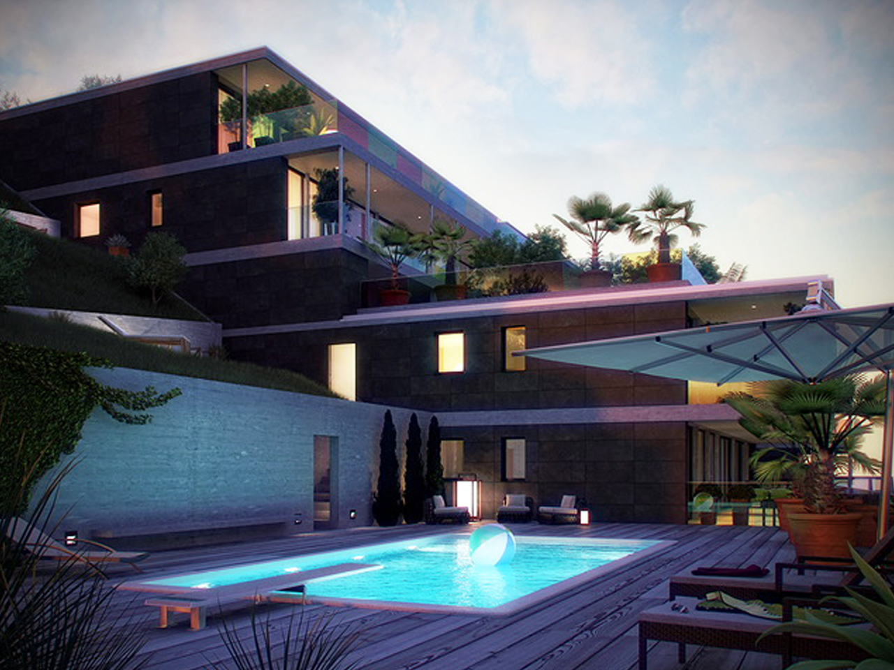 Luxuriöse Poolterrasse eines modernen Terrassenhauses bei Dämmerung