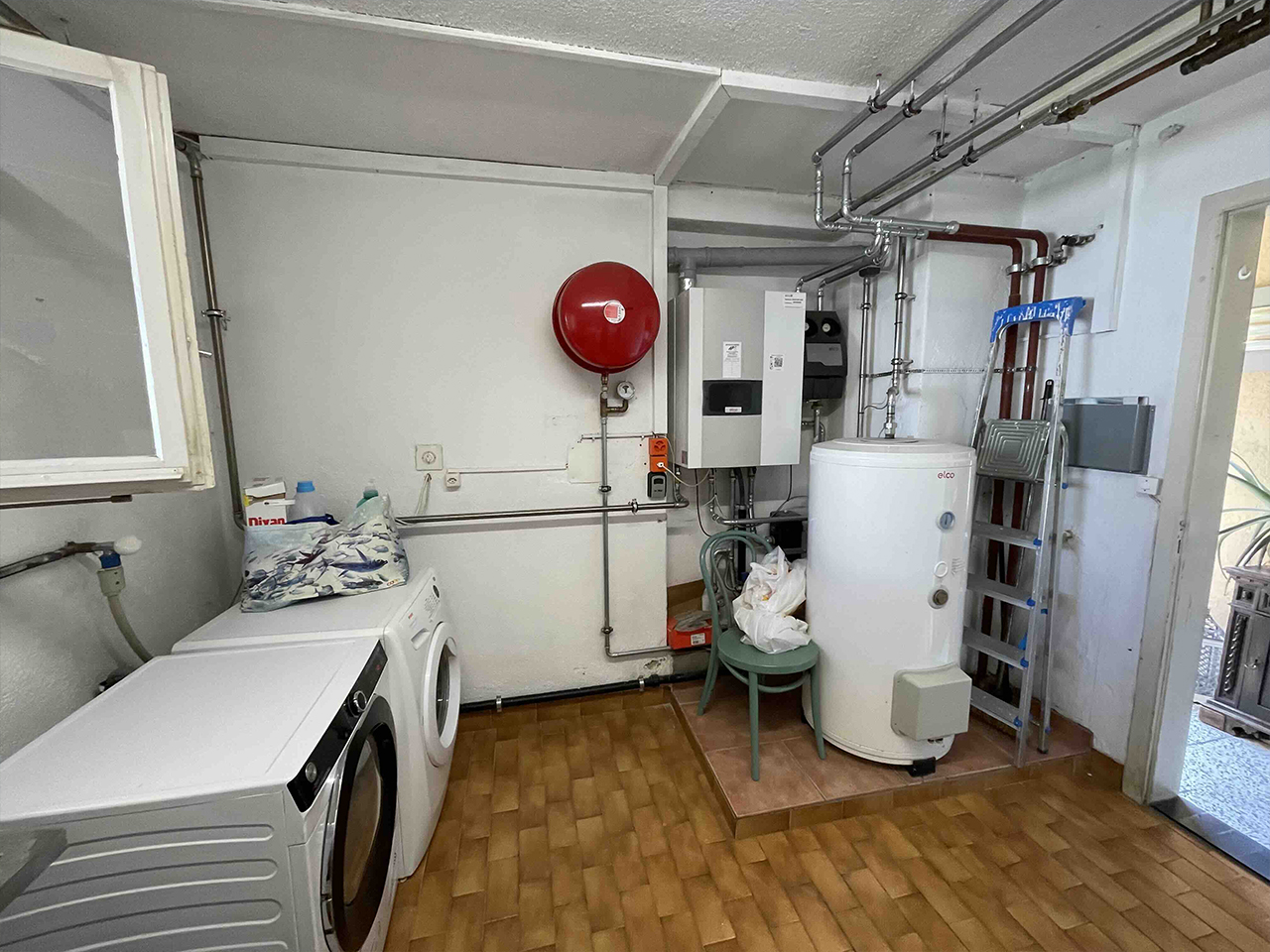 Hauswirtschafts-/Technikraum mit Heizungs- und Waschtechnik