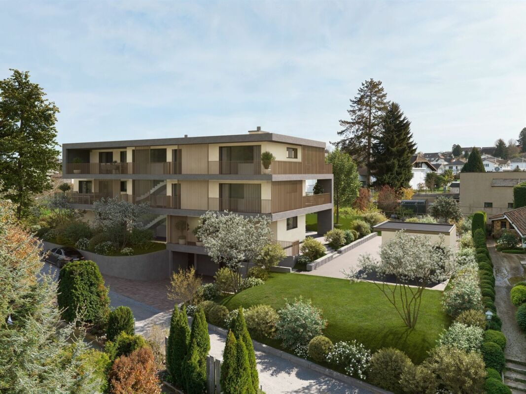Modernes Mehrfamilienhaus mit Garten