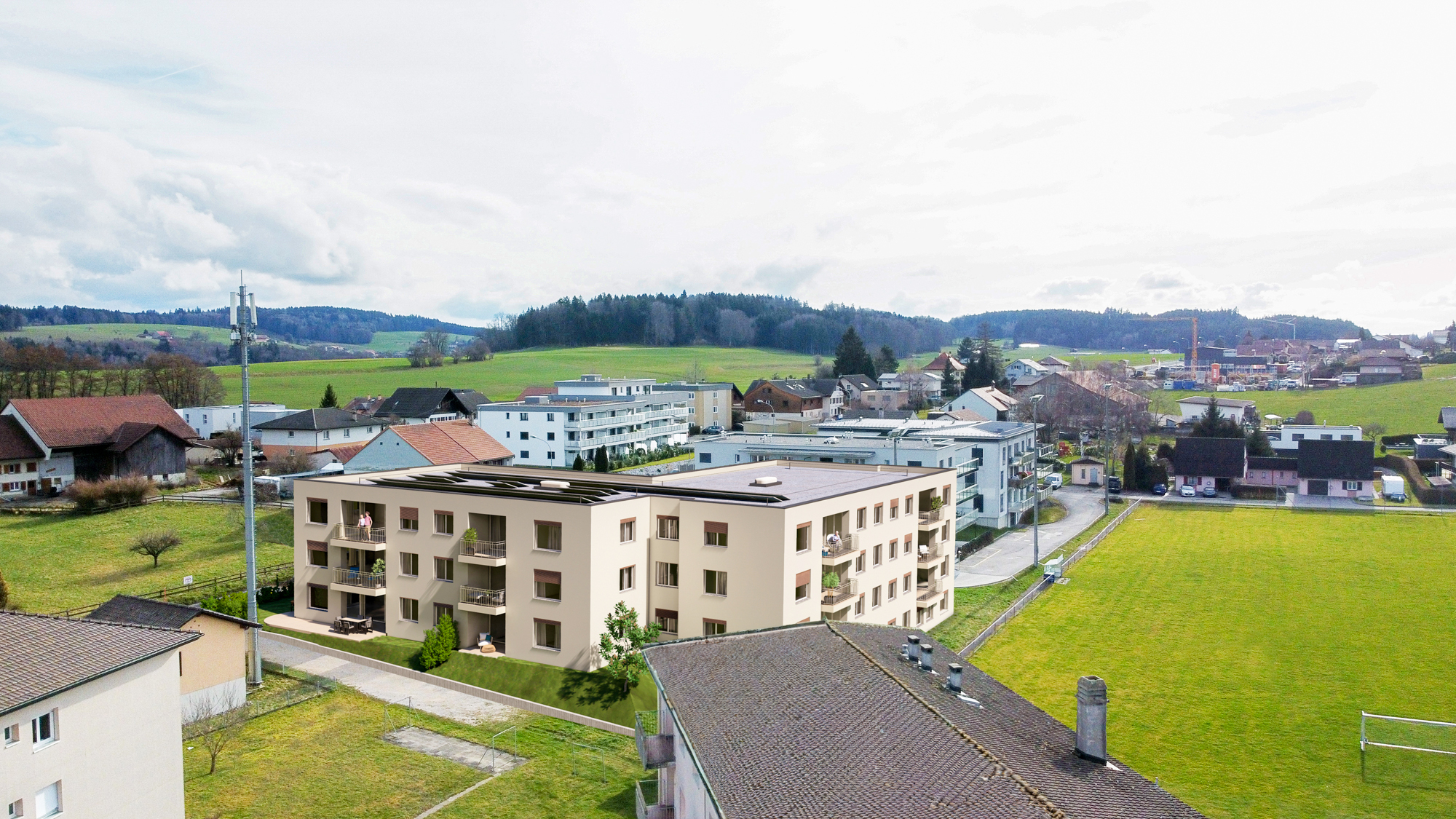 Luftaufnahme eines Wohngebäudes im Grünen