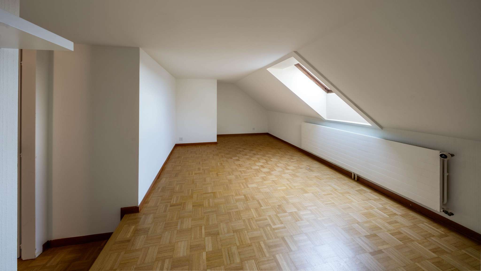 Ausgebauter Dachraum mit Dachfenster