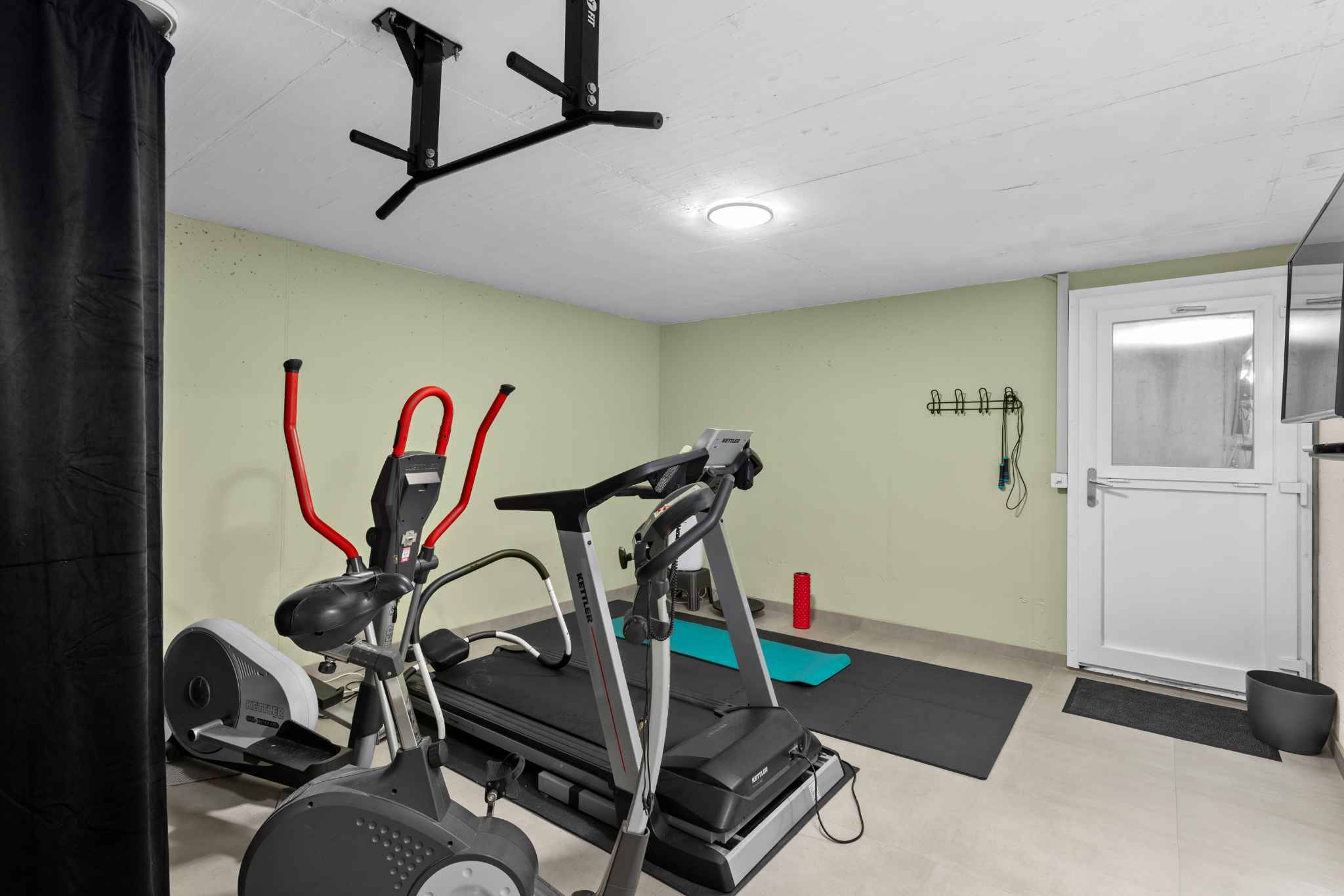 Fitnessraum im Keller