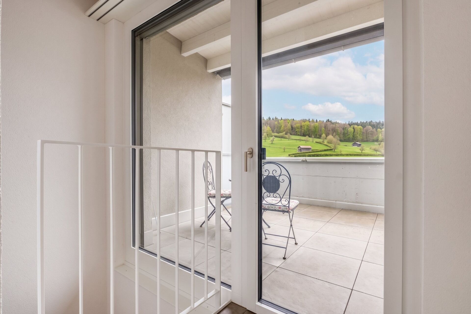 Balkon mit Ausblick ins Grüne