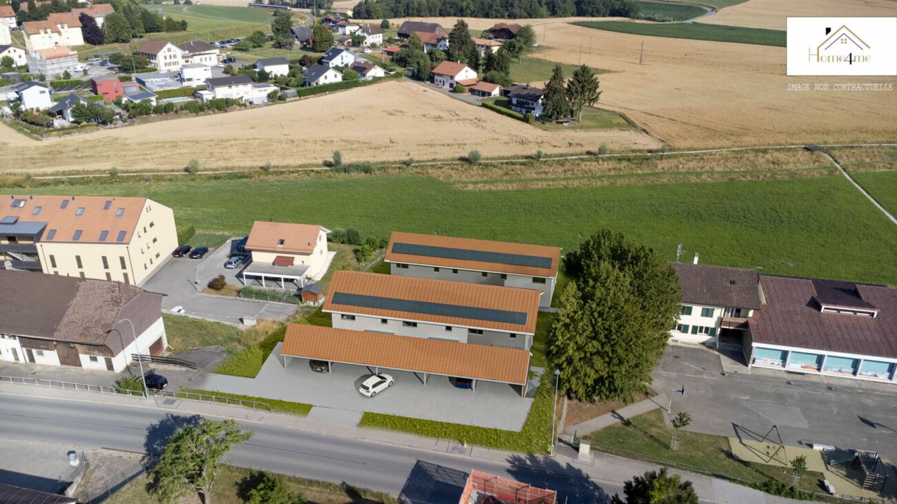 Luftaufnahme eines Wohngebiets mit Solardächern