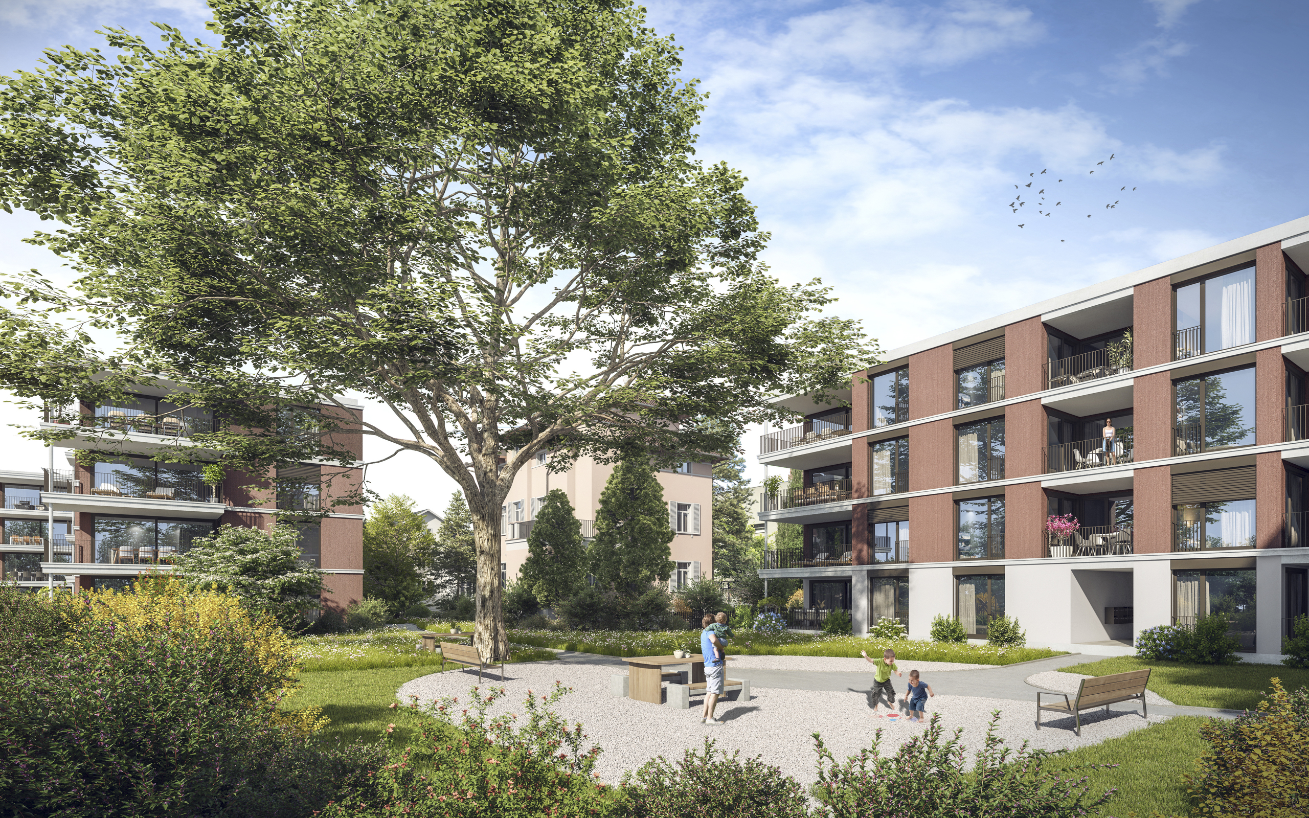 Moderner Wohnhof mit Neubau-Mehrfamilienhäusern und Grünanlage
