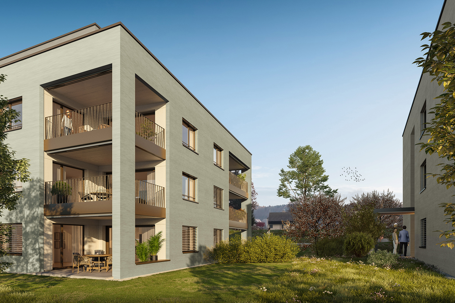 Moderne Wohnanlage mit begrüntem Innenhof