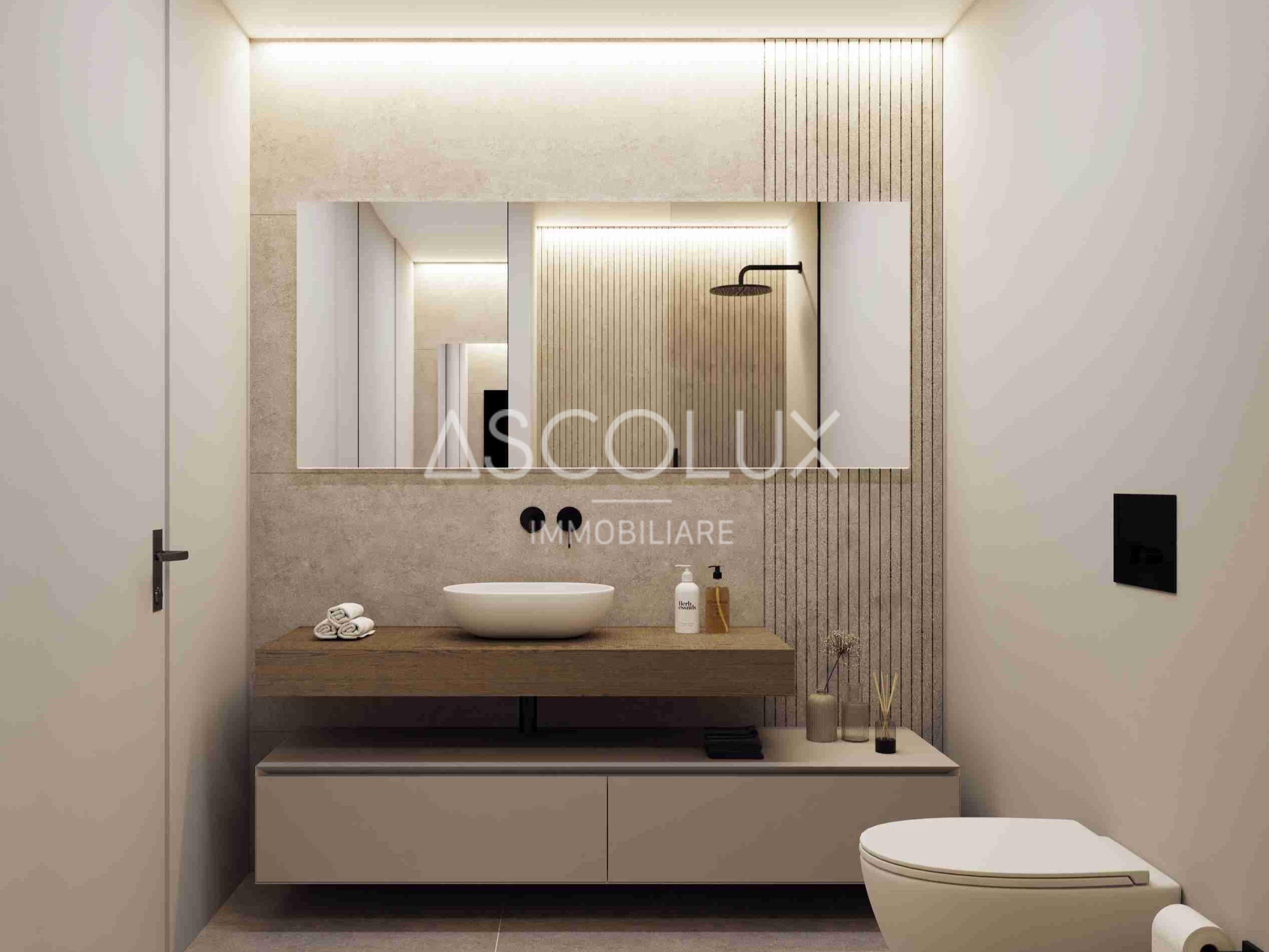 Modernes Badezimmer mit Waschplatz und WC