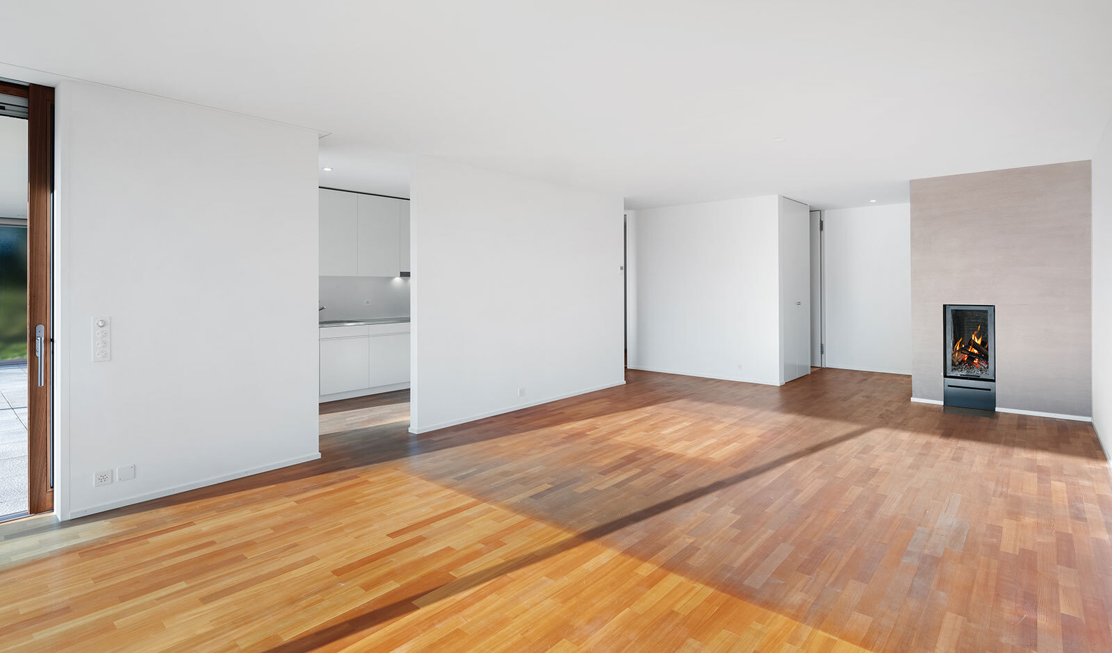 Offener Wohnraum mit Kamin