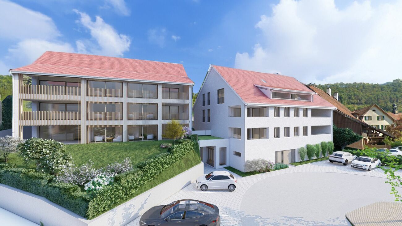 Moderne Wohnanlage mit roten Dächern