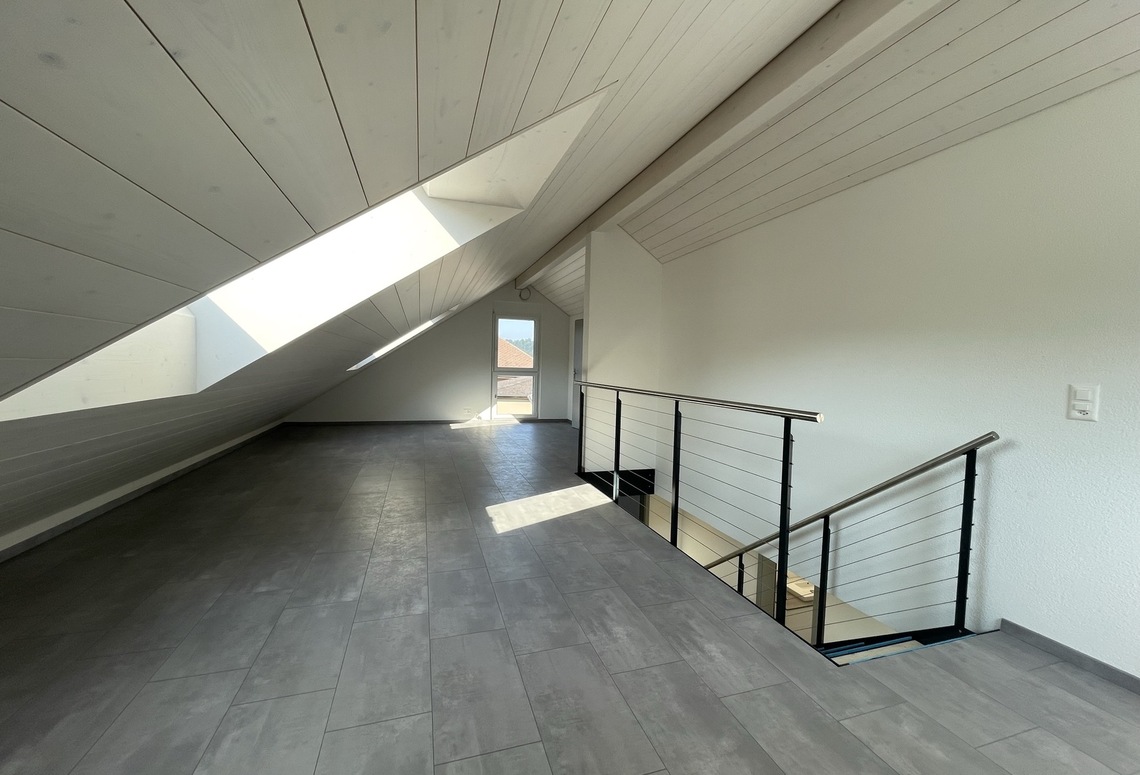 Dachgeschoss mit Treppe und Galerie