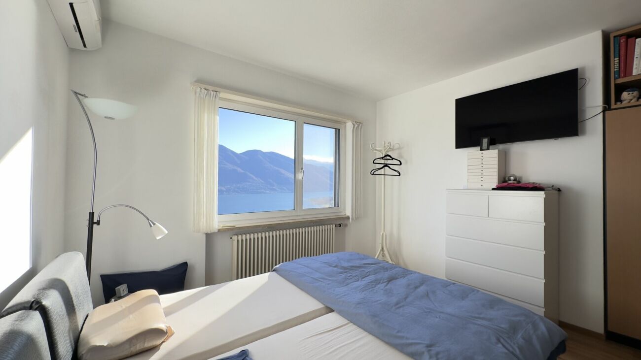 Schlafzimmer mit Seeblick