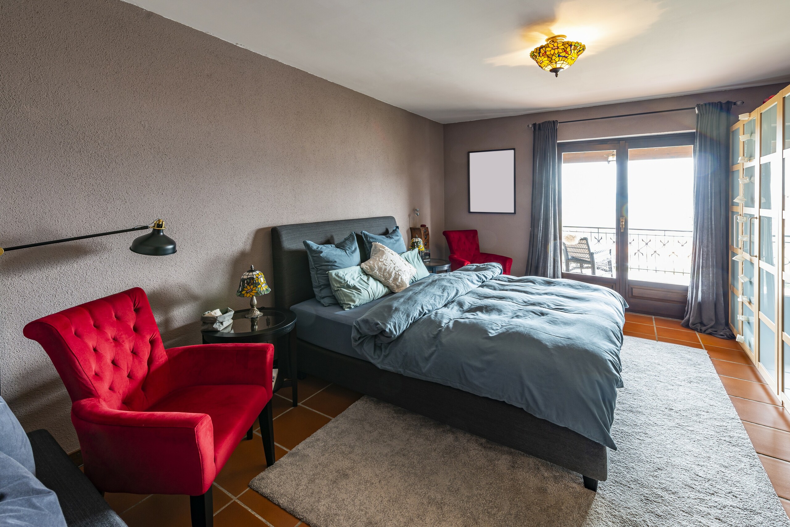 Schlafzimmer mit Balkonzugang