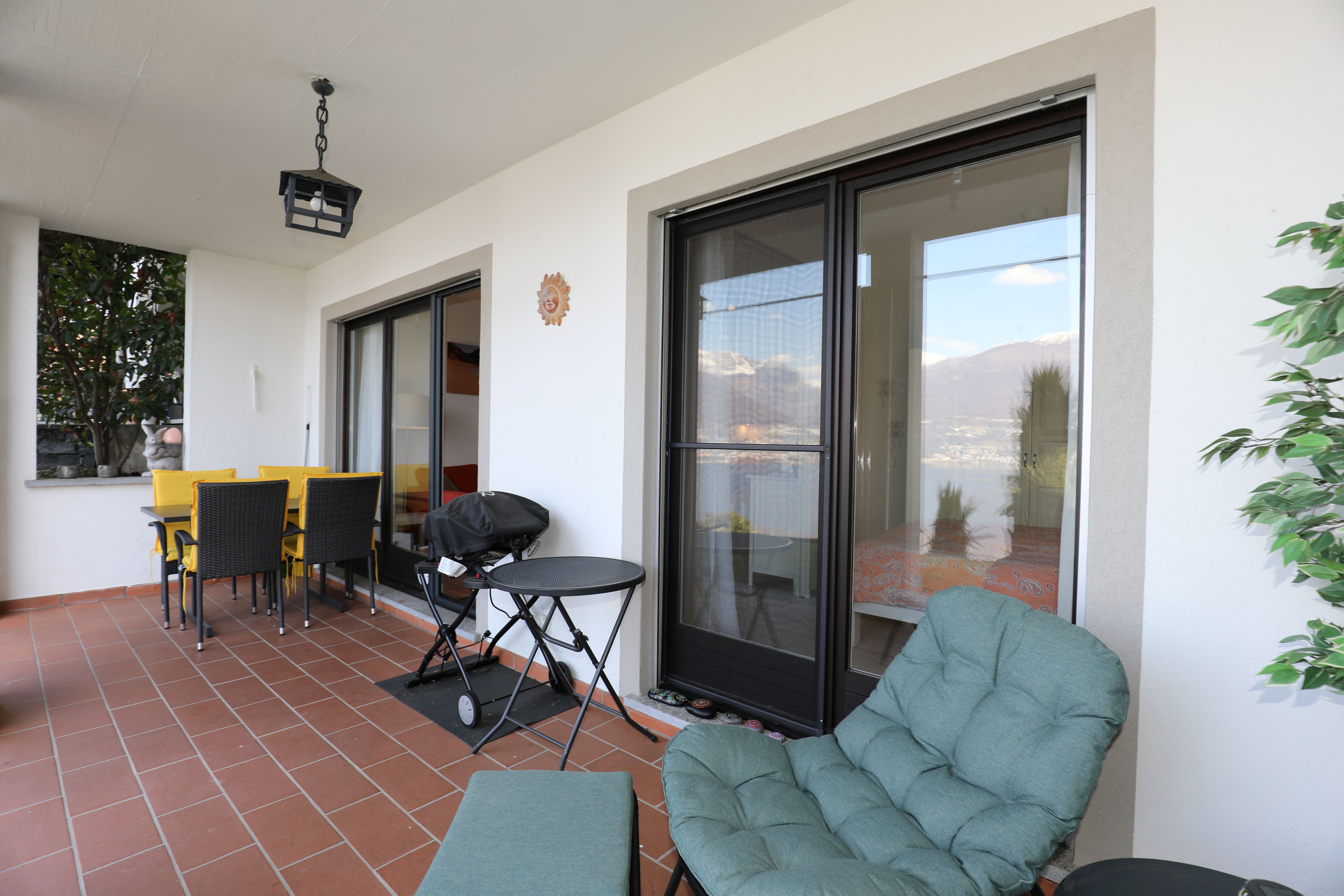 Überdachte Terrasse mit Sitzbereich