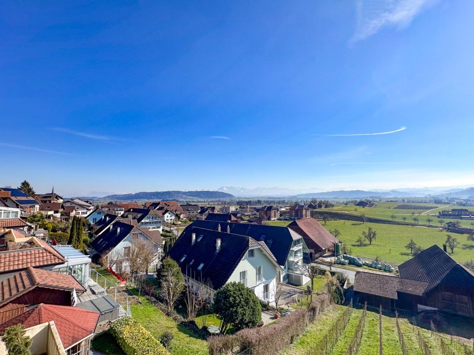 Blick über ein Wohngebiet mit Blick ins Grüne