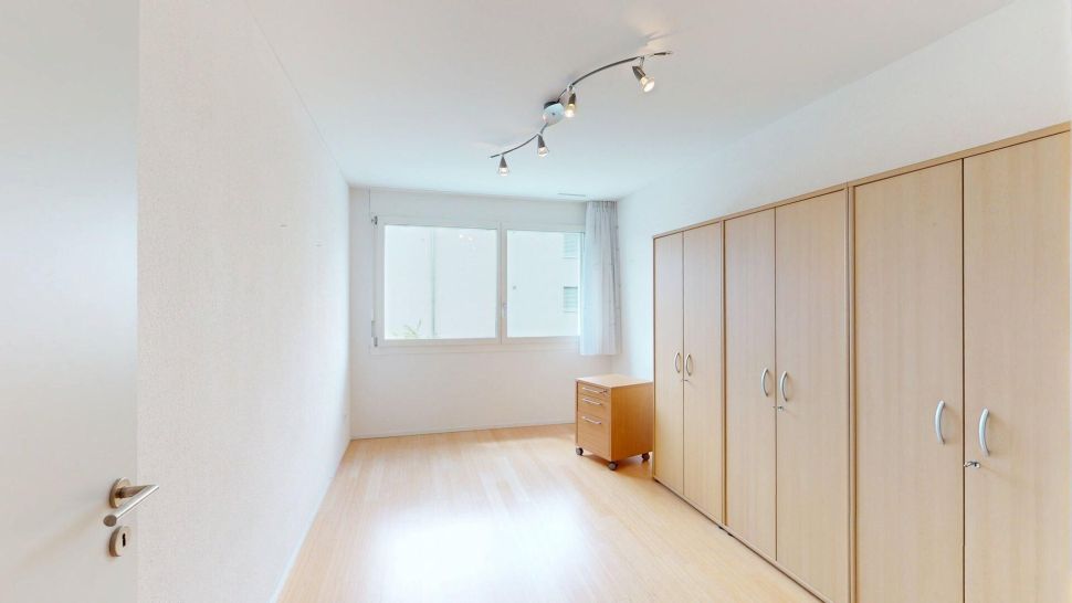 Helles Schlafzimmer mit Einbauschränken