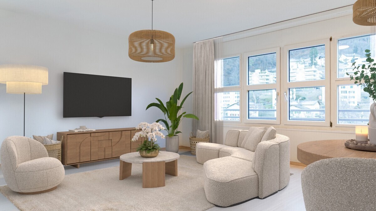 Helles, modern eingerichtetes Wohnzimmer mit großen Fenstern