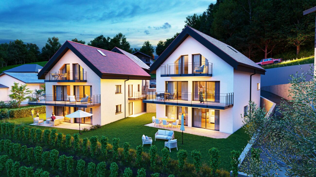 Moderne Wohnanlage mit Gärten und Balkonen