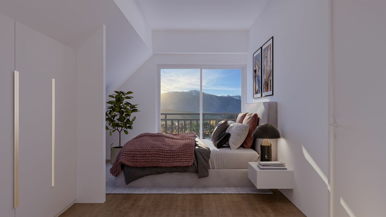 Helles Schlafzimmer mit Bergblick
