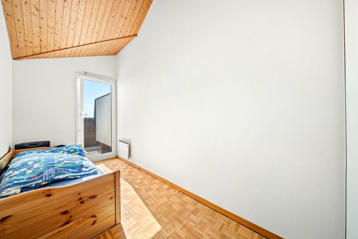 Dachgeschoss-Schlafzimmer mit Dachschräge