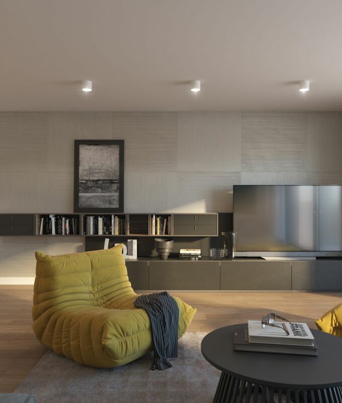 Modernes Wohnzimmer mit Designer-Sitzmöbeln und Medienwand