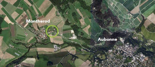Satellitenaufnahme einer ländlichen Siedlungslandschaft mit markiertem Bereich